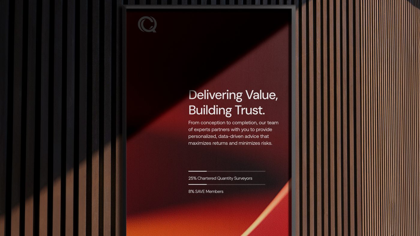 C-Quest single poster on timber-slat wall: Delivering Value, Building Trust, with red gradient