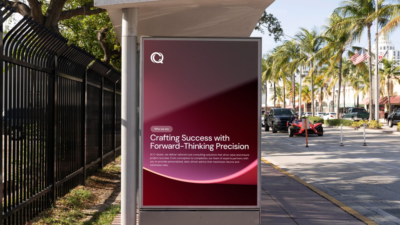 C-Quest bus shelter display in palm-lined street: Crafting Success with Forward-Thinking Precision