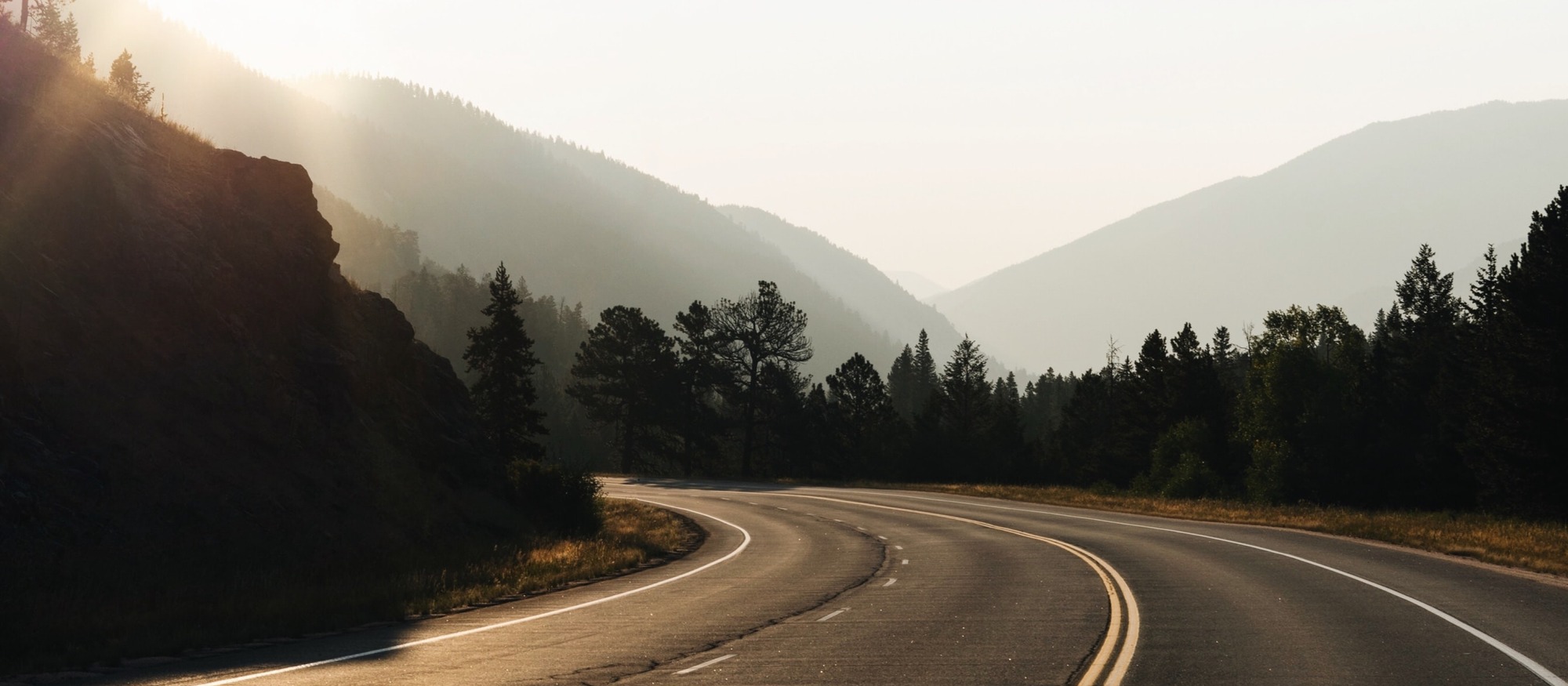 A road climbing toward first light
