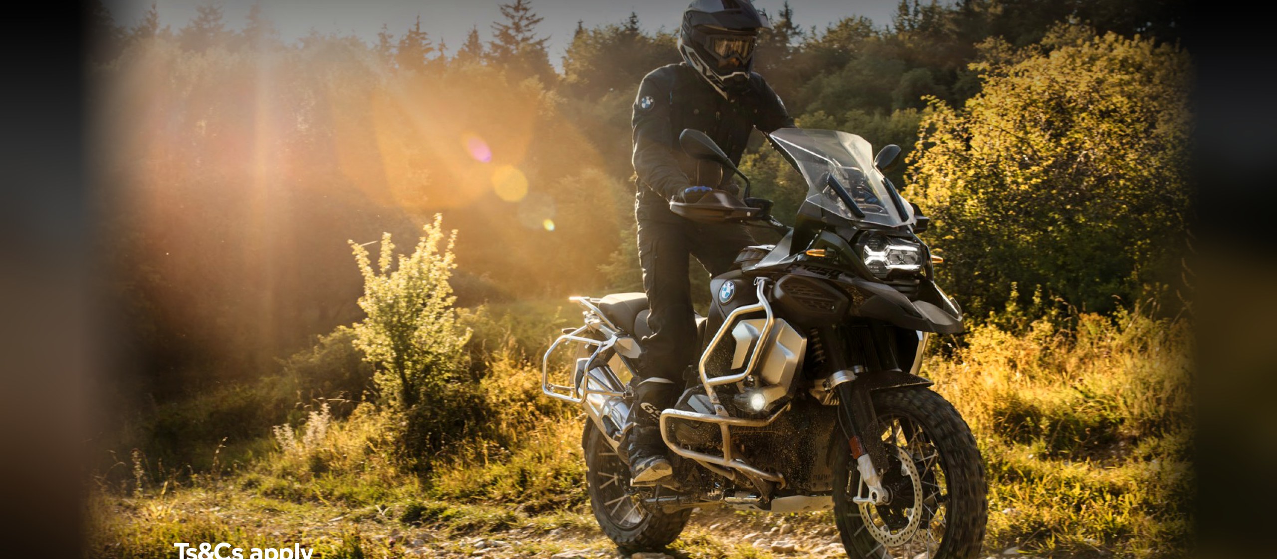 A BMW Motorrad GS Adventure at golden hour