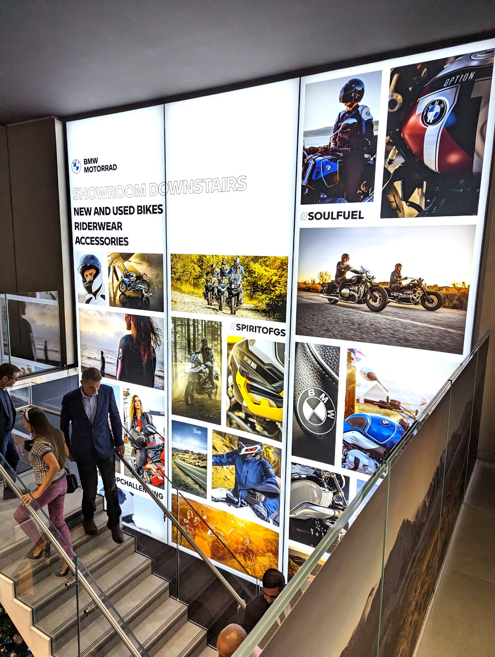 BMW Motorrad feature wall, photographed from the stairs