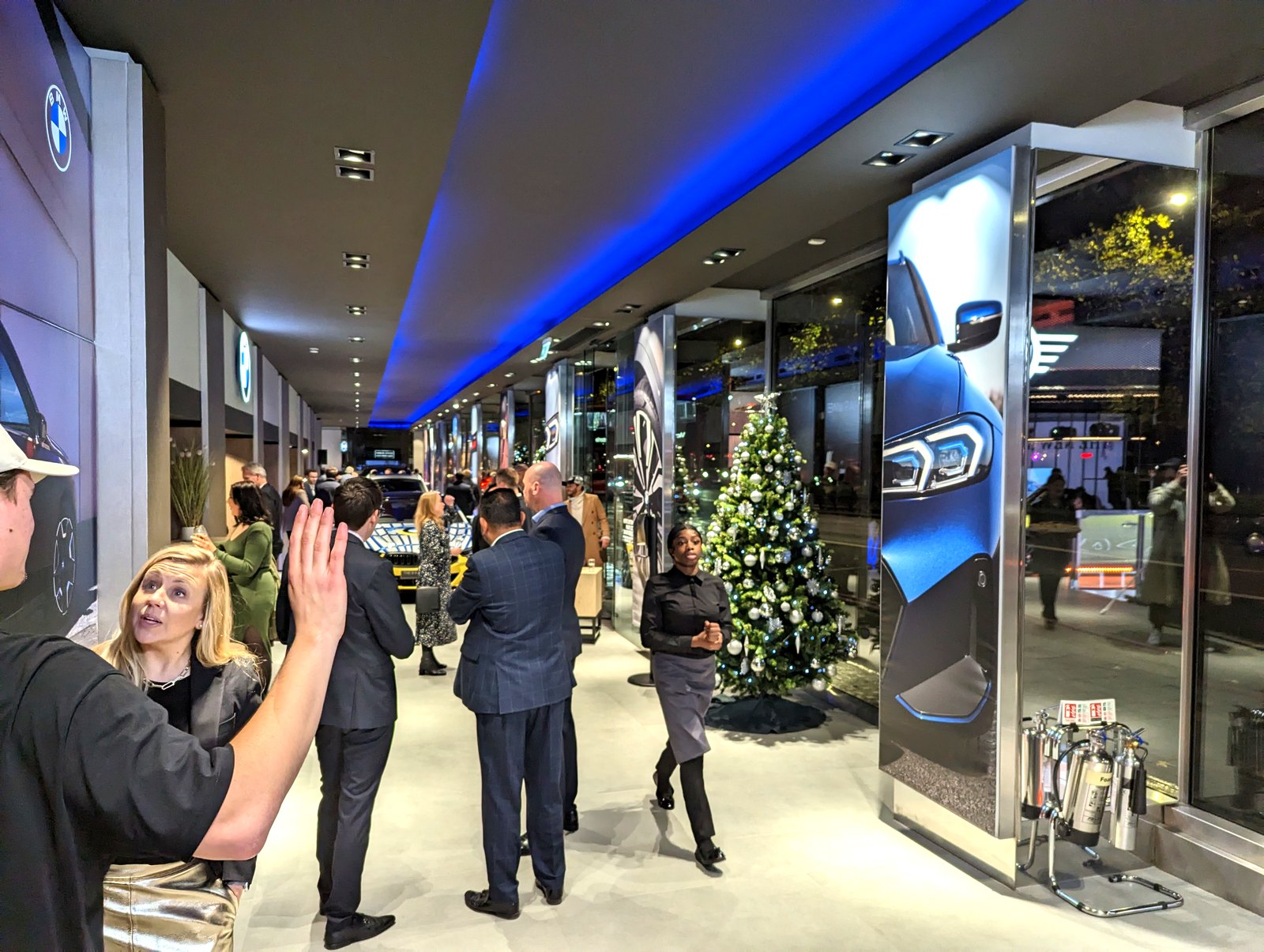 The flagship gallery on opening night, wall graphics along the run
