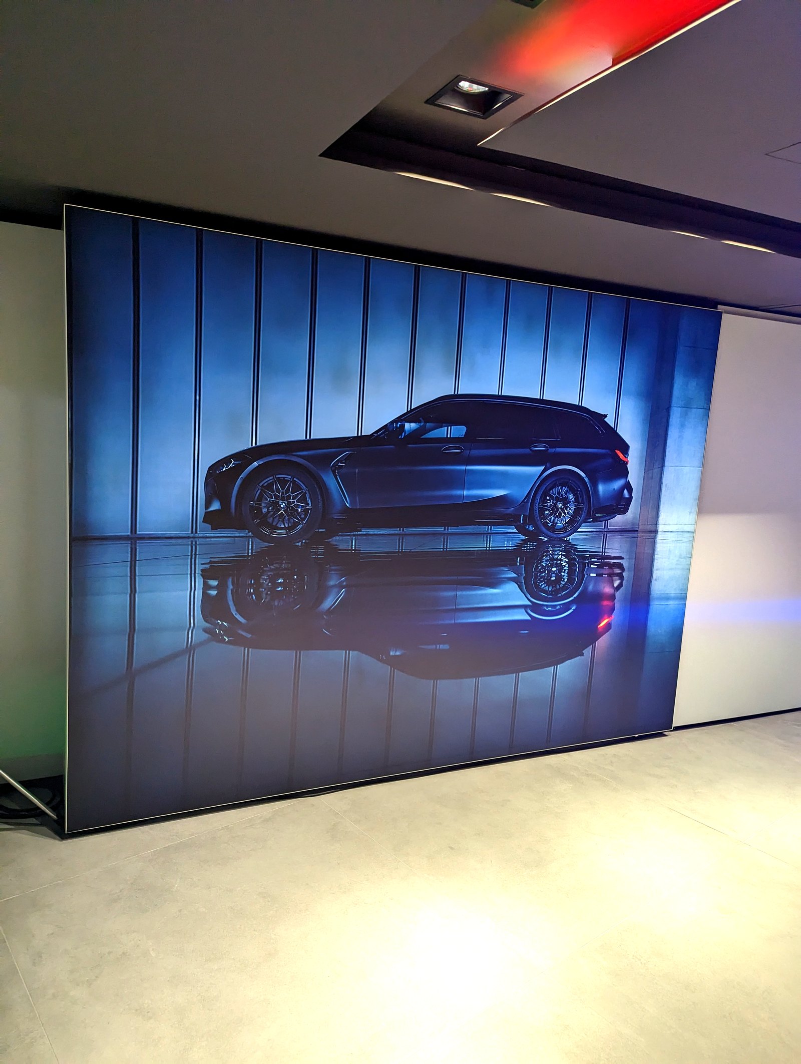 BMW iX large-format wall graphic in the flagship